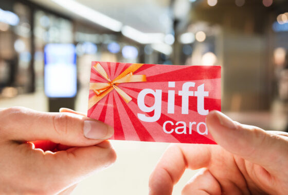 hands holding gift card